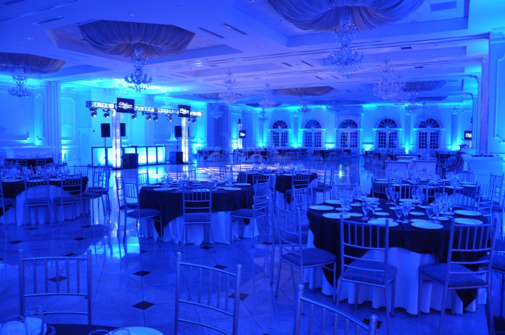 Banquet room illuminated with blue LED uplighting