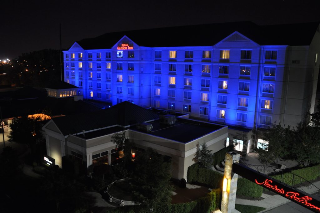 aerial shot of Banquet Hall illuminated with blue spotlight uplighting